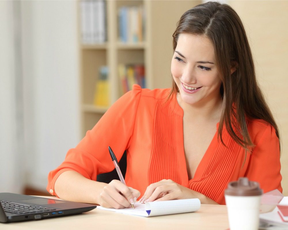 Entrepreneur working taking notes