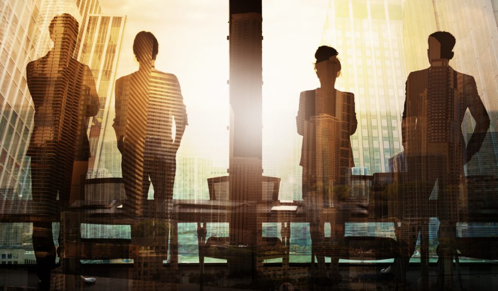 Group of business partner in office looking for the future. Concept of future of work and artificial intelligence.